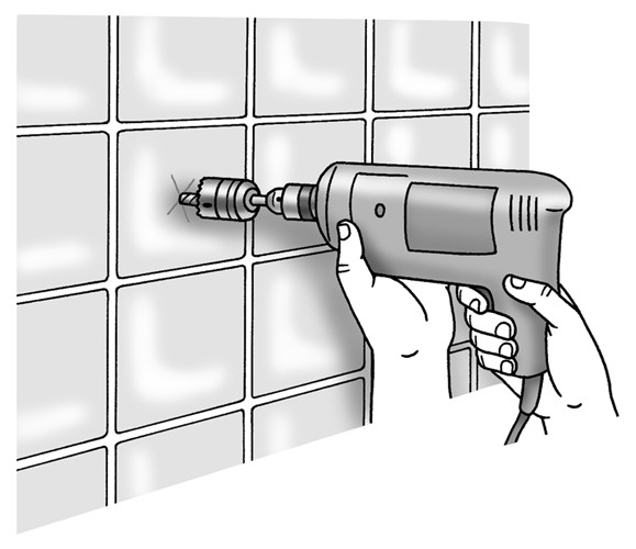 Figure 7-6: Use a carbide-tipped hole saw to bore the opening for a wall anchor.